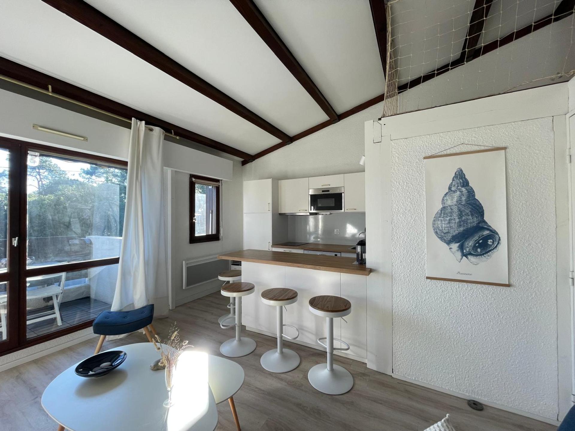 Location appartement - Loft - 4 couchages - piscine commune - Cap Ferret Centre