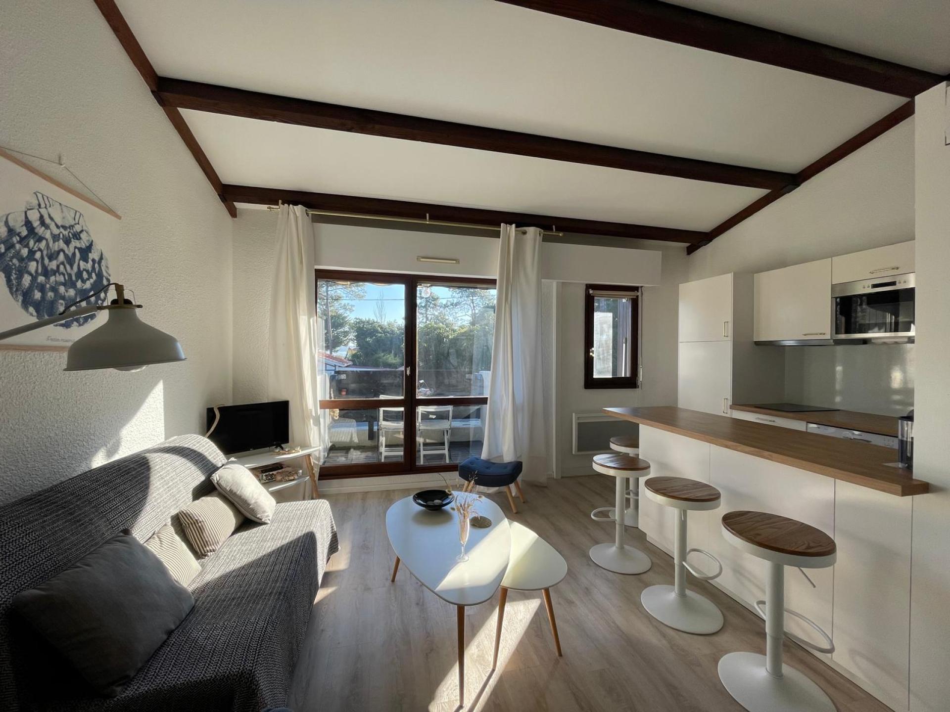 Location appartement - Loft - 4 couchages - piscine commune - Cap Ferret Centre