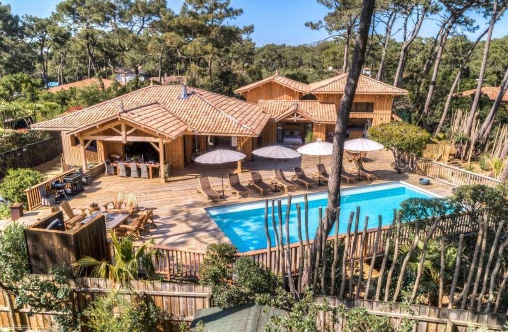 Location villa 5 chambres avec piscine chauffée proche Bassin et Océan - Cap Ferret